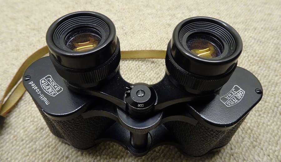 A close up of some Jena Jenoptem binocular lens covers.